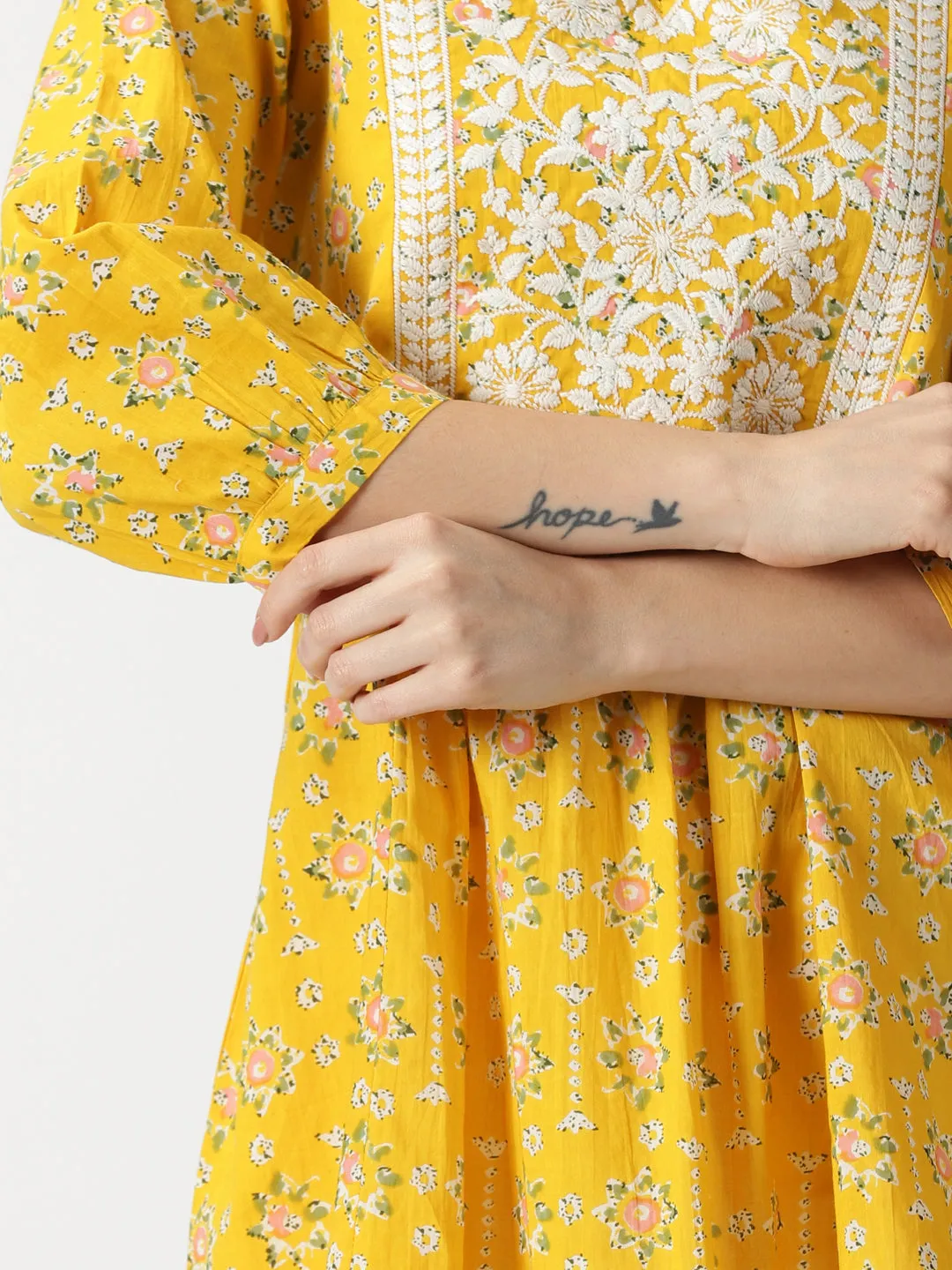 Yellow Floral Print Cotton Tunic with Lucknowi Chikankari Yoke